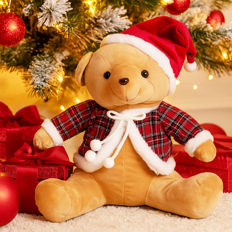 Medved plišast, sedeč, z božično kapo in oblačilom, 35x30x35cm, sort.