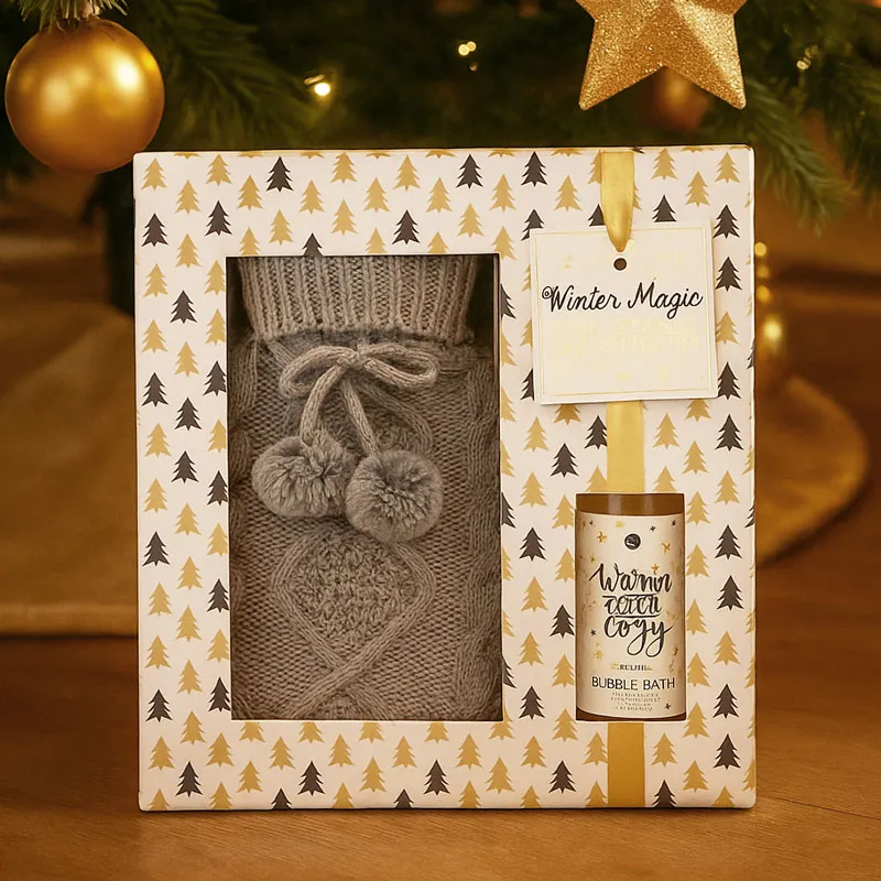 Darilni set WINTER MAGIC, (100ml peneča kopel, termofor oblečen v pulover, 500ml) , z vonjem vanilije, v darilni škatli