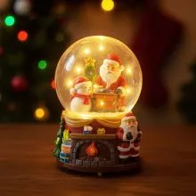 Snežna krogla, božiček z božično smreko in darili, z LED lučko, ter glasbo, polimasa, 9x9x12cm, sort.