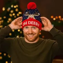 Kapa zimska s cofom, božični motiv, z LED lučkami, sort.