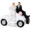 Hranilnik, poročni par sedeči na avtu, polymasa, 12x10cm